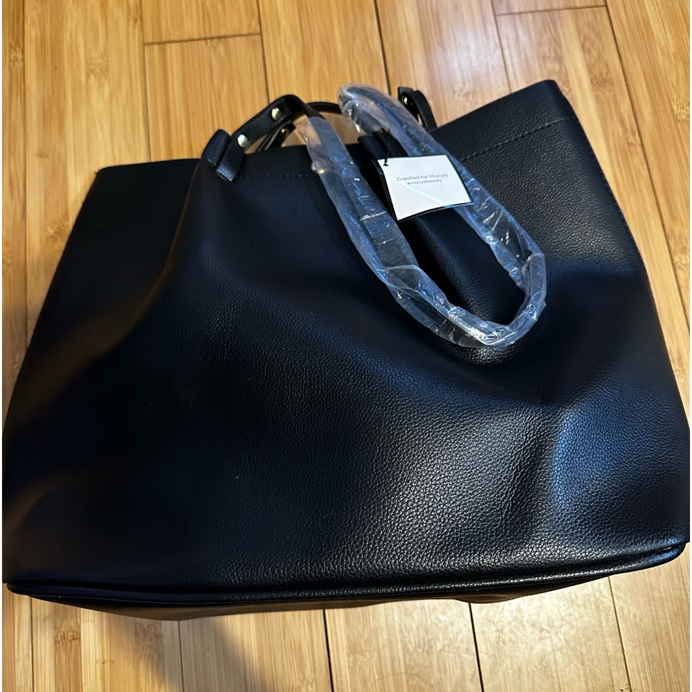 Brand new black leather “carry it all” bag